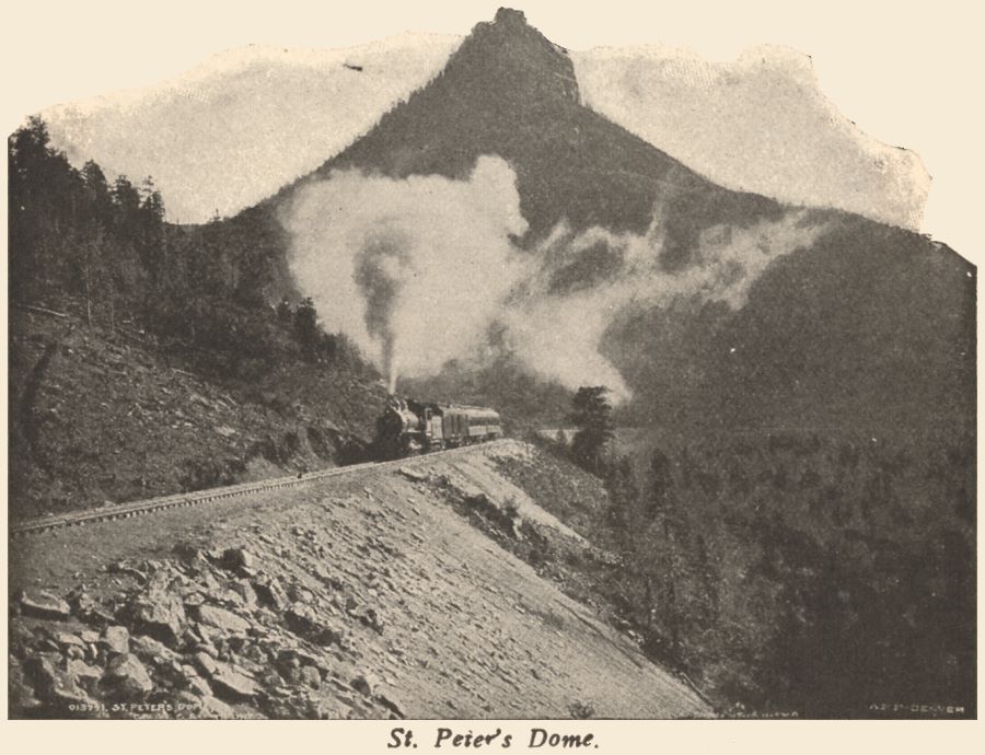 View a train climbing the grade with St. Peter's Dome in background, photo by William Henry Jackson