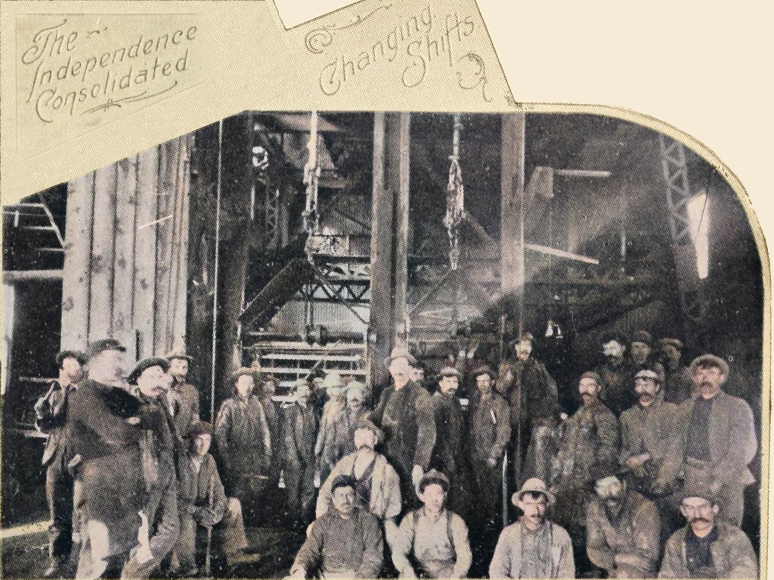 This sadly not so good quality view of the interior at the Shaft of the Hull City Mine is still though an important catching of a scene at the timeframe it is from. A large group of Miners are posing to get captured as there is a change of Shifts at the Hull City mine. We can see there are two cages behind them, saying this is a huge operation at this time.
   I did procure the colored version of this image. Source was grayish, or in common speech black & white. Used an online service and tweaked and worked with image to get what looks best to my eyes at the moment.