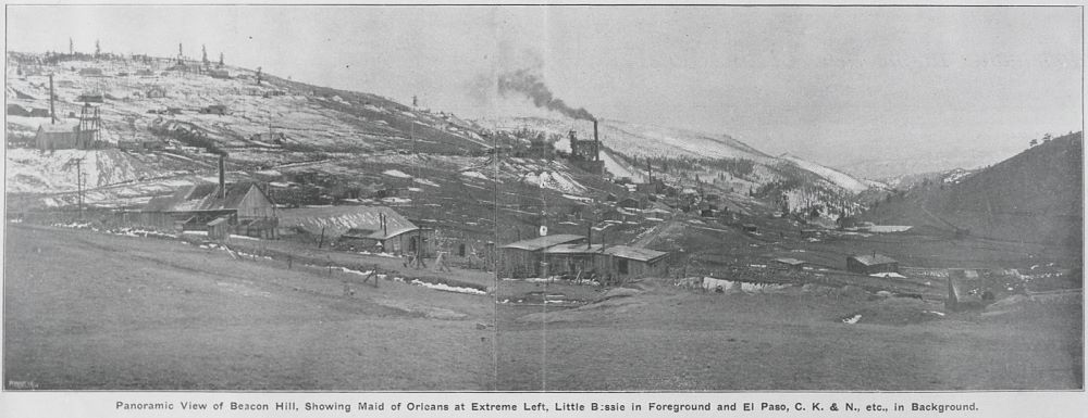 This not so great view shows many of the mines on Beacon Hill. Extreme left is the Maid of Orleans, Little Bessie is in the foreground and the El Paso, C. K. & N., etc., is in the background middle. Far down valley at right hand side is part of the F. & C.C. switchback branch line down to the Henry Adney & Old Gold mines.