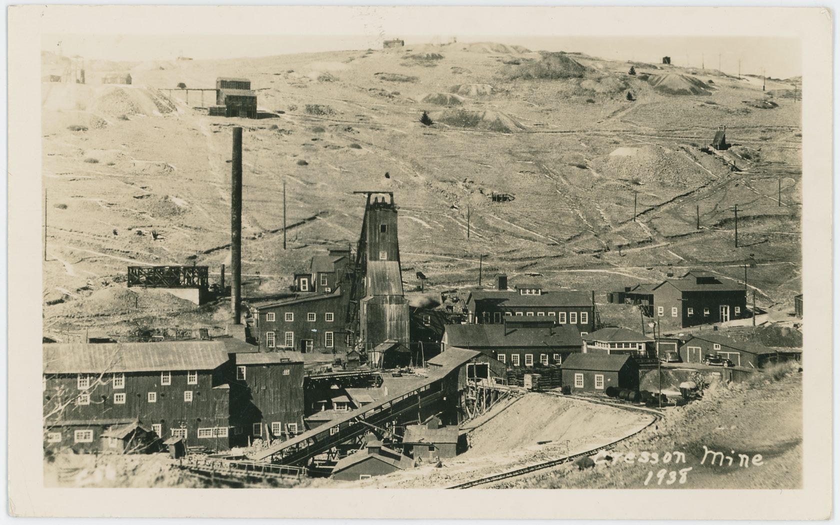 This is the 8th postcard I've seen (as of July 21, 2018) using the base image this is from, this is one of those editions where the text 1938 appears under the words 'Cresson Mine' in lower right. Raven Hill is in the background and sorry, no, I've yet to figure out what mine has that Ore-House seen near upper left, seen just above top of the Cresson Smokestack.