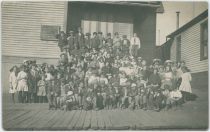 Lots of Children of Victor Posing at/on the Steps to the Presbyterian Church